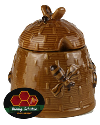 forest honey in rustic ceramic beehive